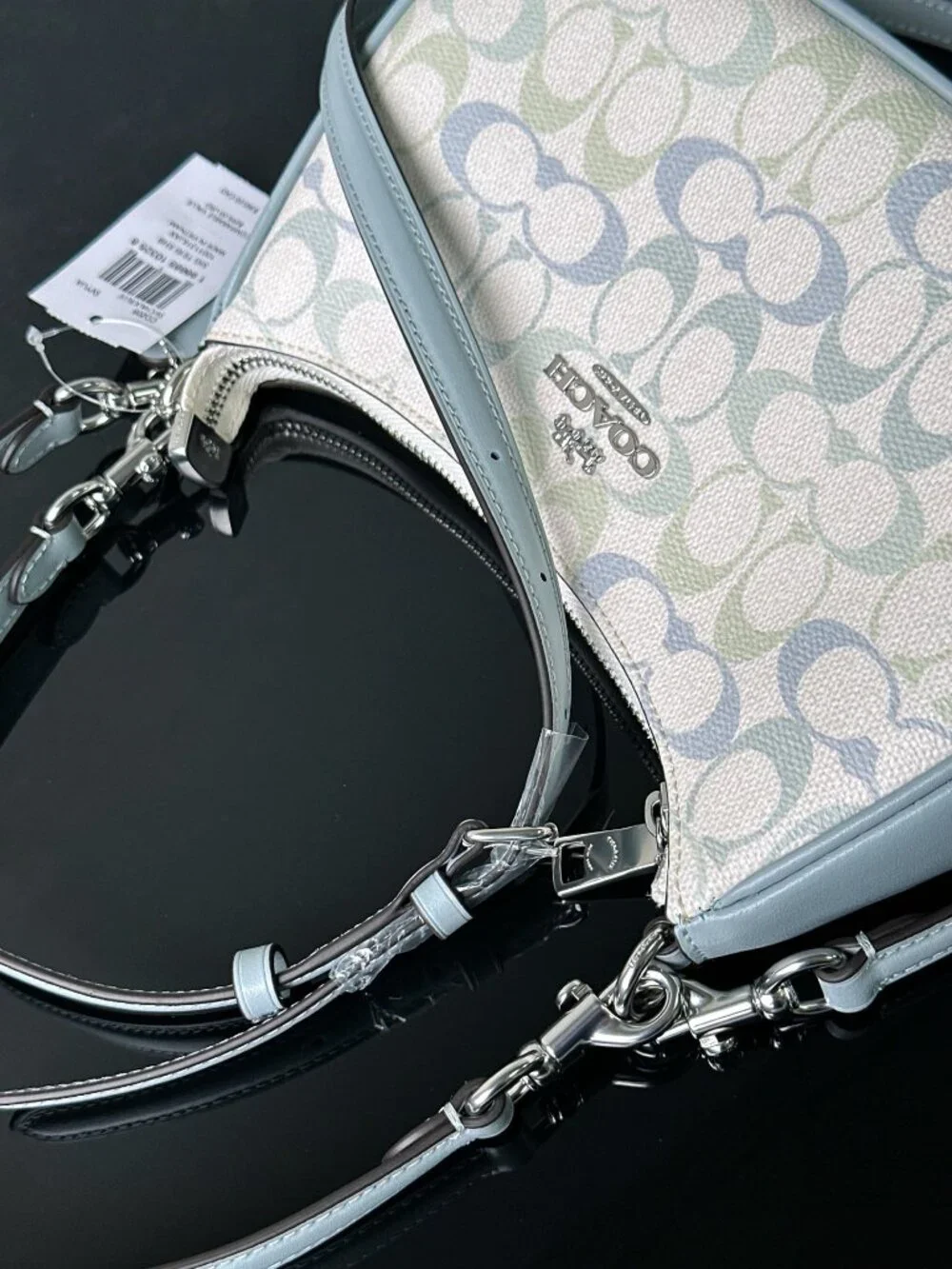 Coach signature coated‑canvas